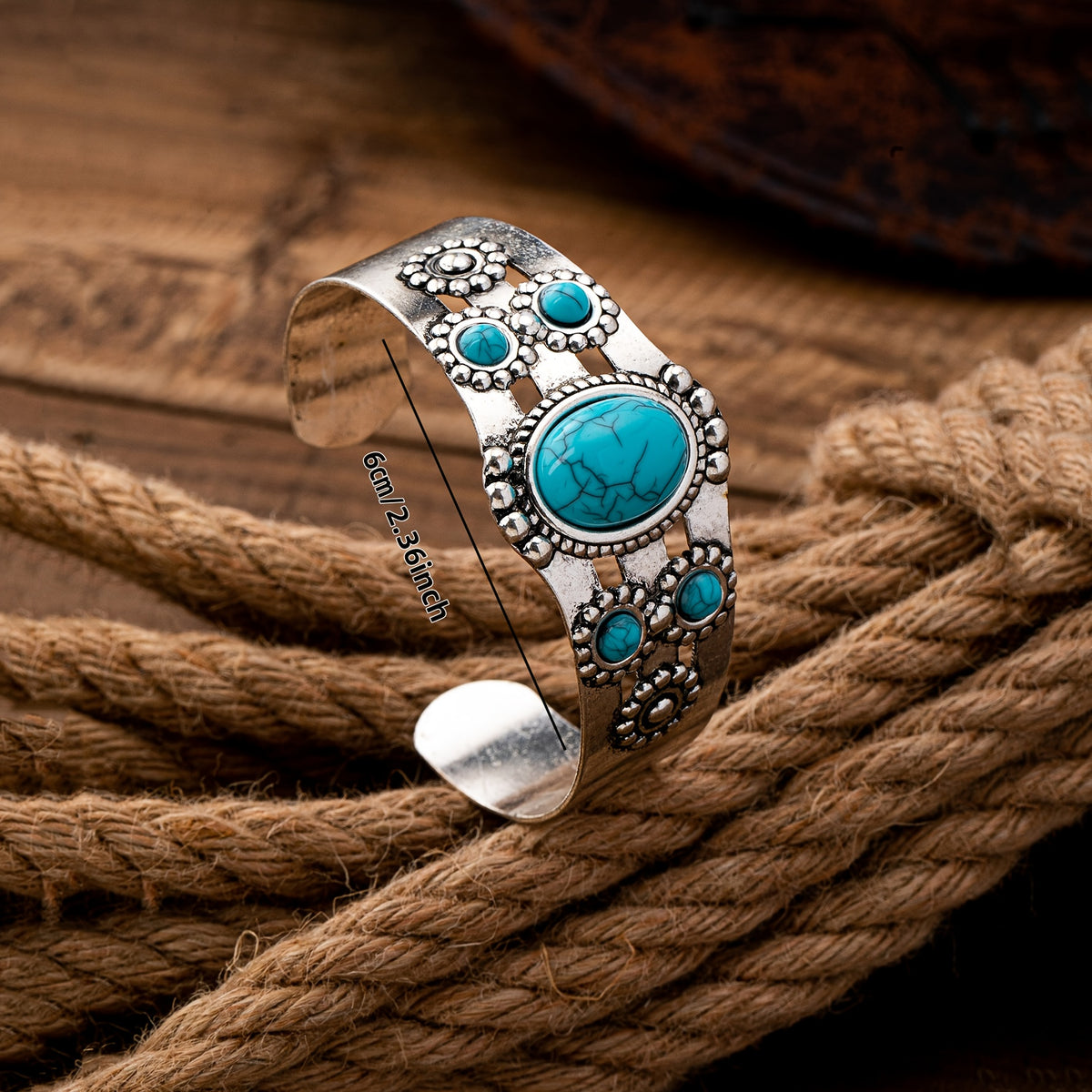 A Bohemian Style Open Cuff Bracelet Featuring an Oval Geometric Design Inlaid with Turquoise, Perfect for Everyday Wear, Gifting, And Vacations